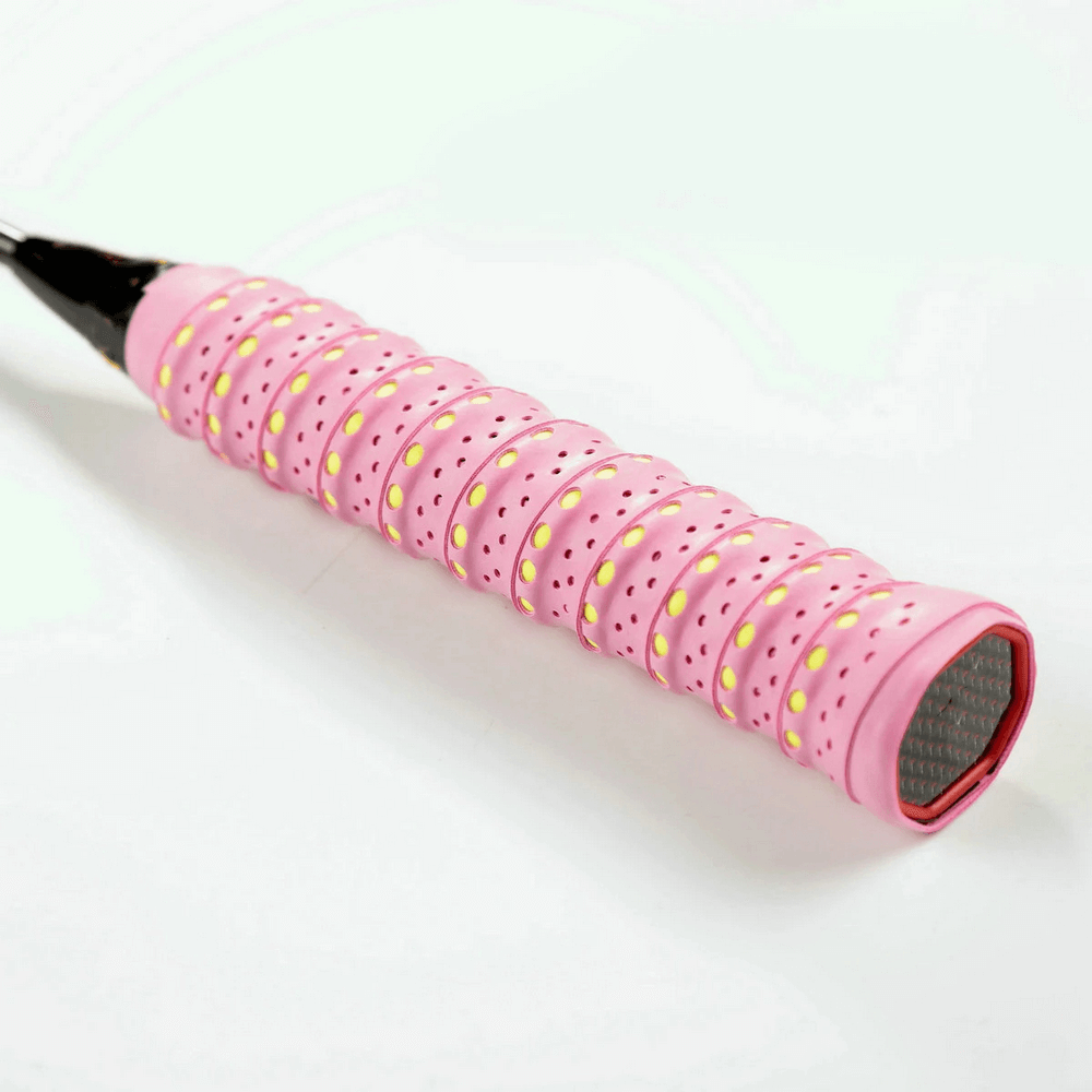 Vibrant pink perforated anti-slip tennis racket overgrip tape - SF3437, offering durable sweat absorption and secure hold.
